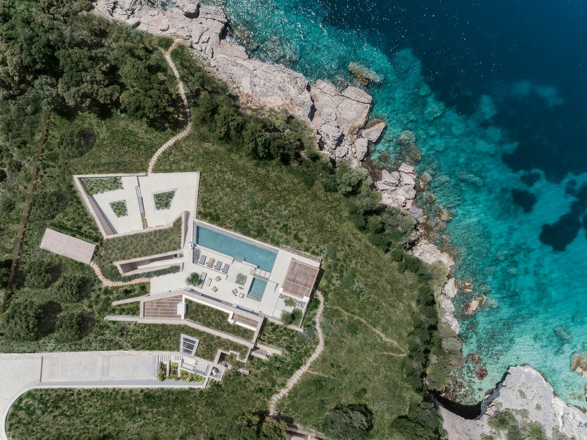 Uma casa de frente para o mar na Grécia 65820894 original | Arquitetura | arquitetura, casa, curioso, praia
