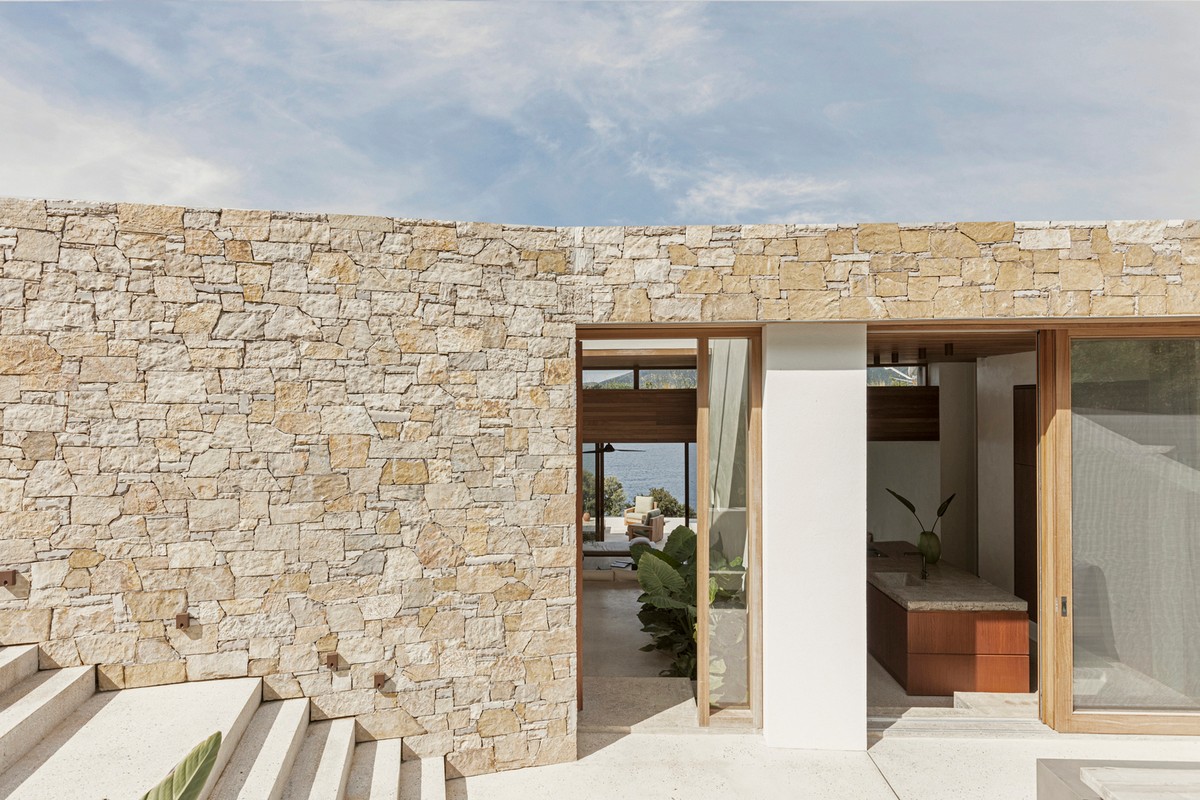 Uma casa de frente para o mar na Grécia 65821005 original | Arquitetura | arquitetura, casa, curioso, praia