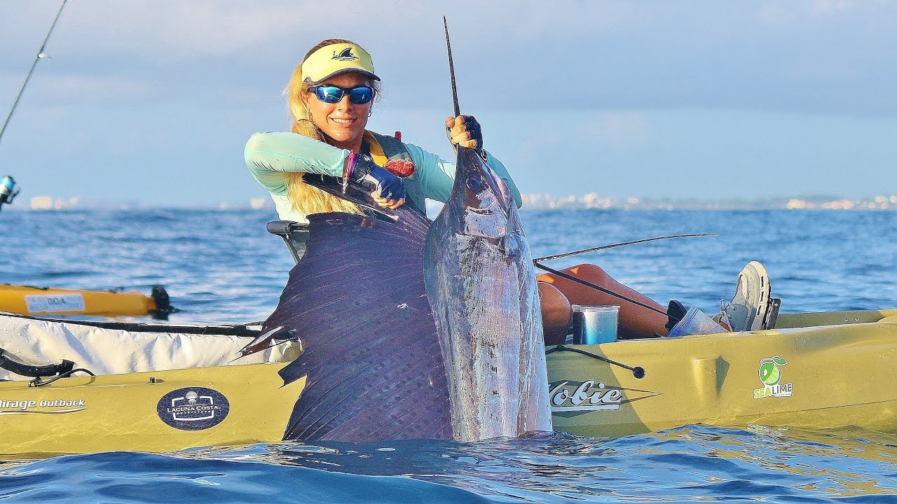 Caiaque de Pesca Duplo: A Dupla Aventura nas Águas Pensa numa briga épica puxar um marlin num caiaque!
