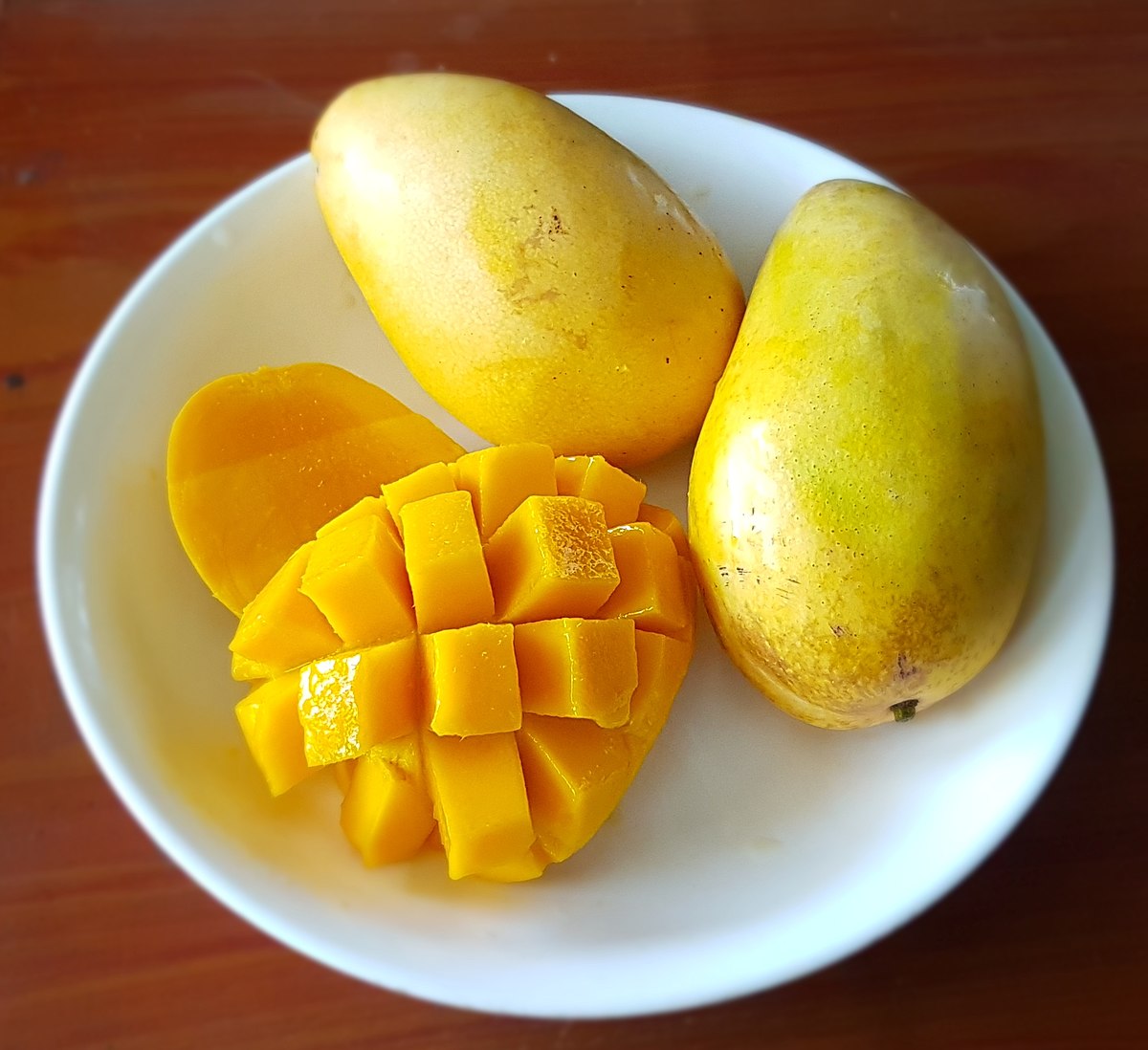 Uma breve história da manga 1200px Carabao mangoes Philippines | Curiosidades | alimento, comida, curioso, fruta, história, mangá, planta, vegetal